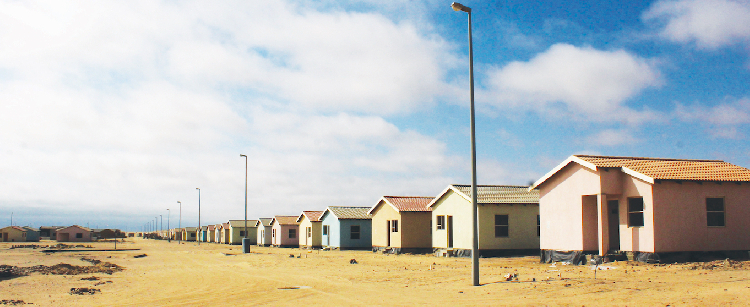 319 half-built mass houses handed  over for completion at Swakop - The Namibian
